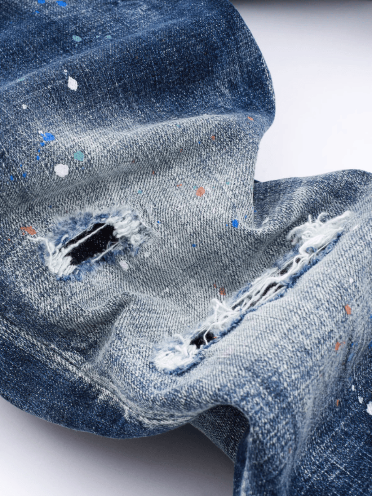 Washed Blue Ripped Jeans